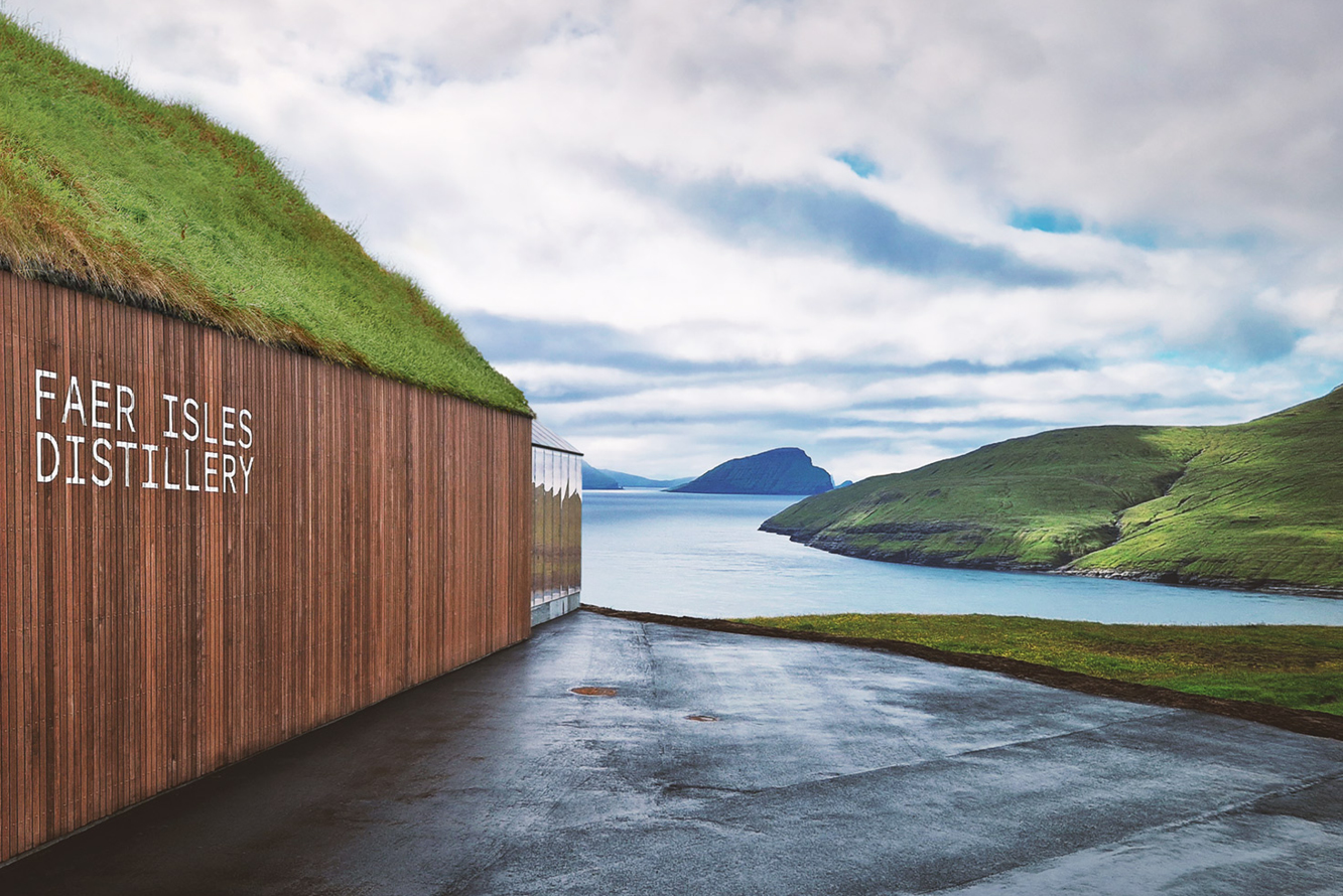 Faer Isles distillery by the water